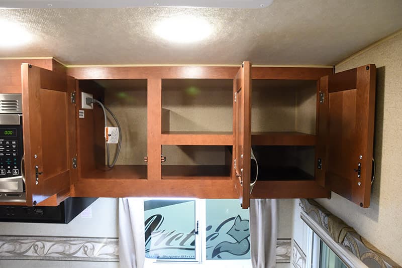 Arctic Fox 992 kitchen storage cabinets open