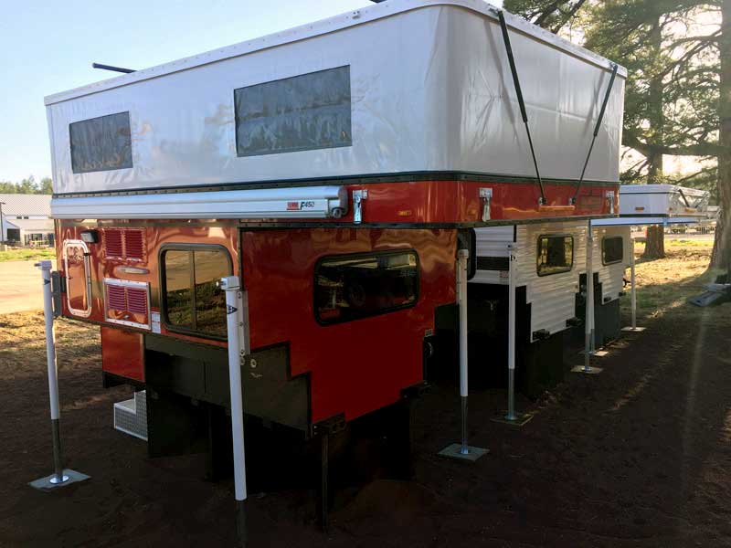 Red Four Wheel Camper Fiamma