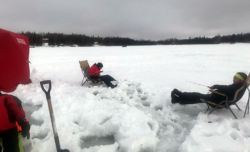 Grand Kids Ice Fishing In Alaska