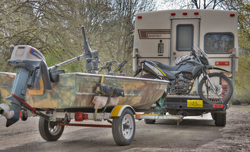 Aluminum Boat And Bigfoot Camper