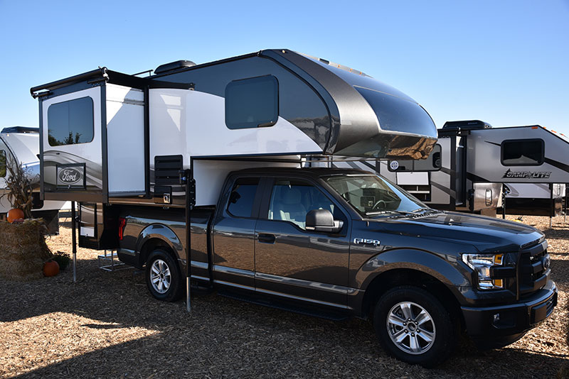 https://www.truckcampermagazine.com/wp-content/uploads/2018/08/Ford-Campers-2015-Elkhart-Slide.jpg