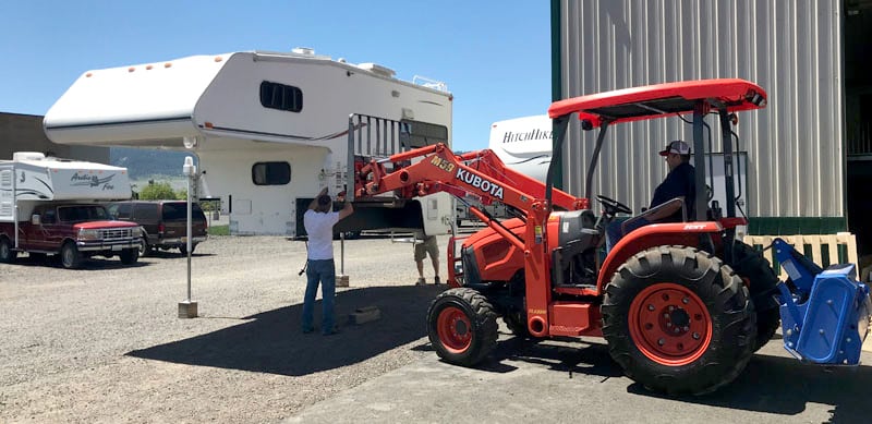 Forklift Holding Camper Up