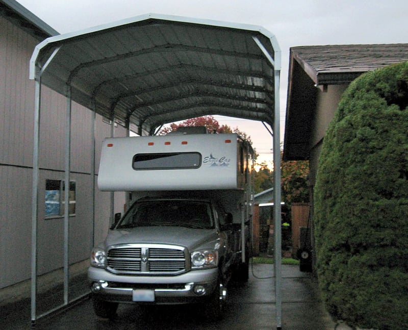 Truck And Camper Under Canopy