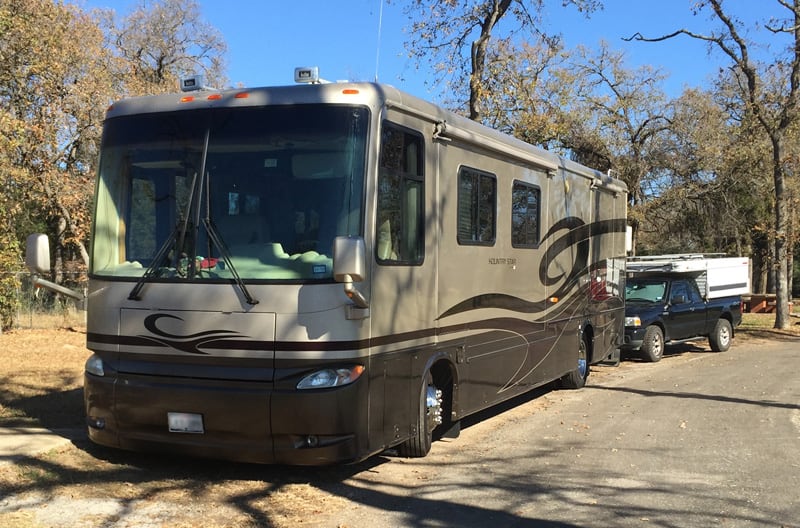 Motorhome Tows Popup Truck Camper