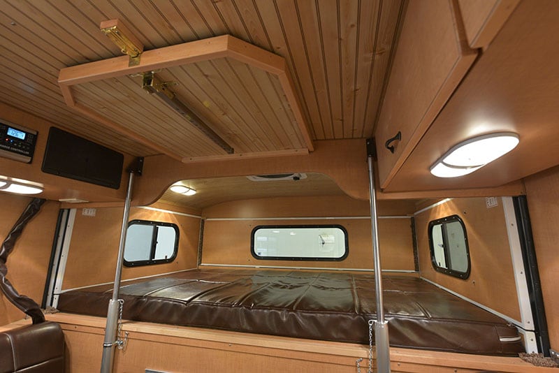 Alaskan Campers Have A Table On The Ceiling