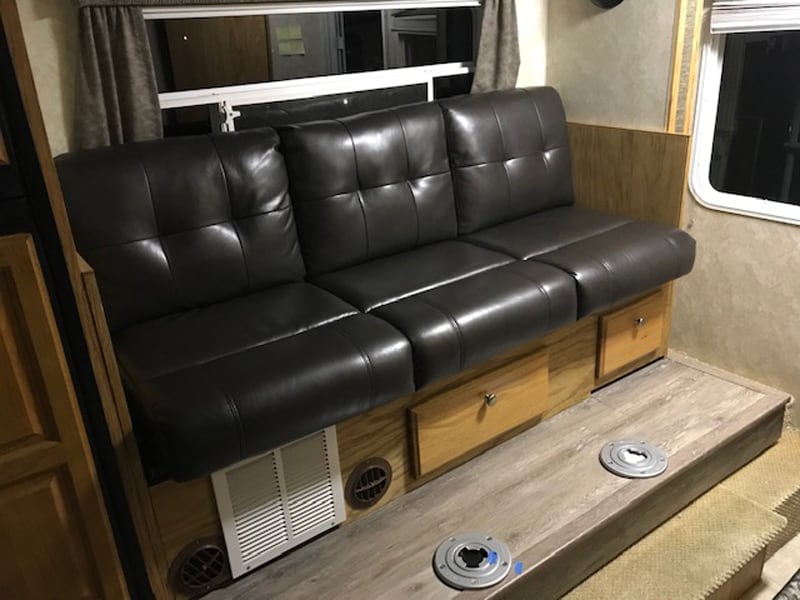 Jackknife Sofa In Arctic Fox Truck Camper