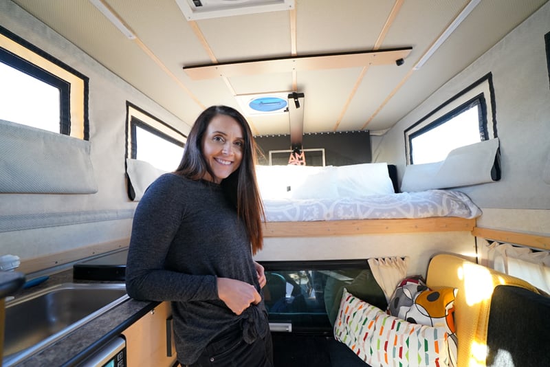 Mirella Inside Their Four Wheel Camper Swift