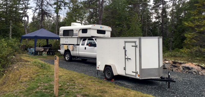 Campsite At Acadia Schoodic Woods Campground With Motorcycle Trailer In Foreground