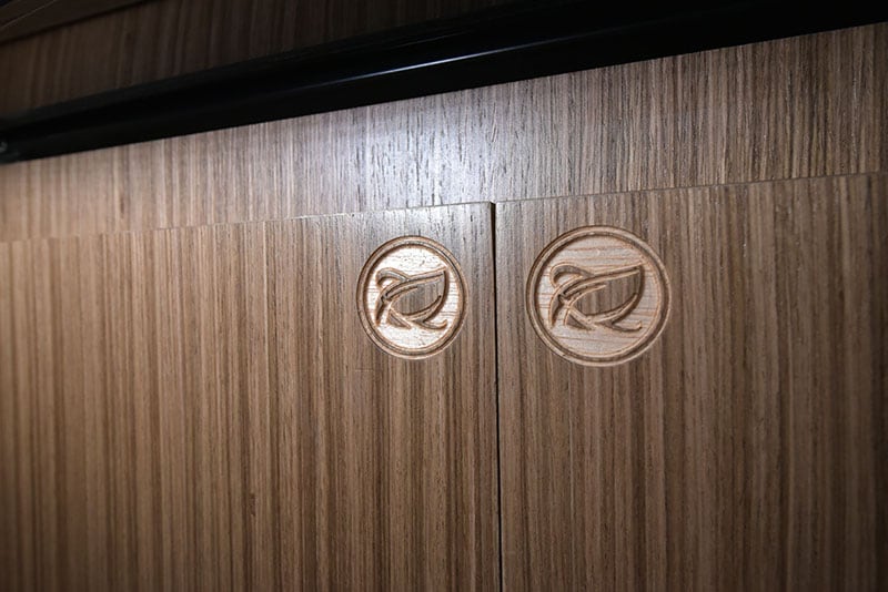 Cirrus 720 NuCamp Logo Engraved Cabinetry