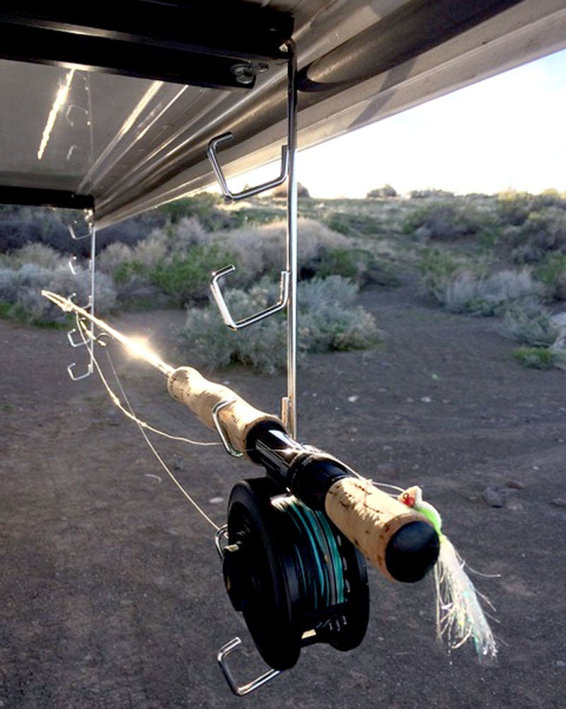 Fly Fishing Rods Hanging On Camper Wing