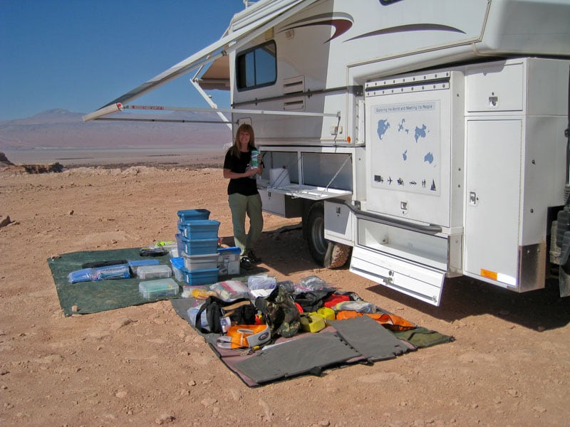 Cleaning and reorganizing the passenger side storage bins. San Pedro de Atacama, Chile