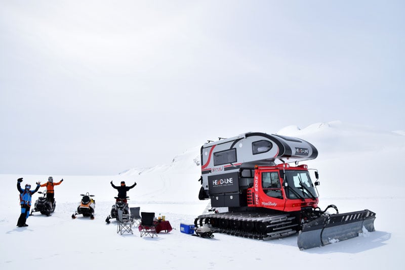 Camp Set Up On Ice Cap And Snowmobiles