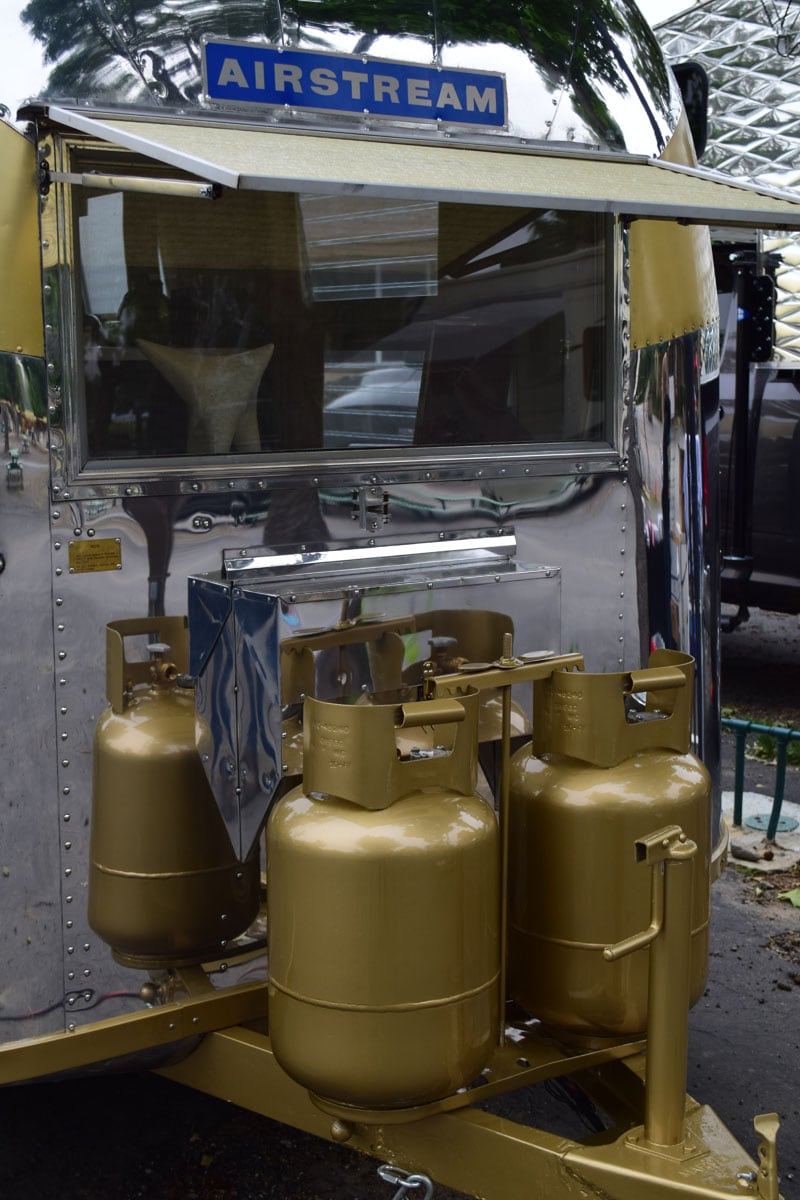 Airstream With Golden Propane Tanks