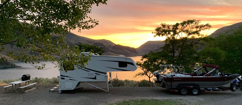 Camper Off Truck At Lake