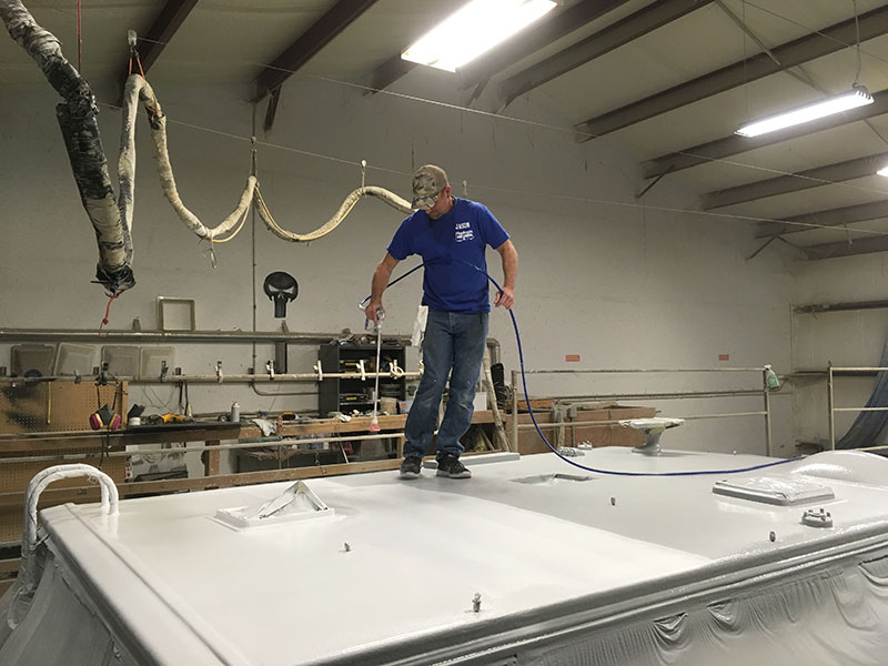 FlexArmor Roof Install Applying White UV Coating