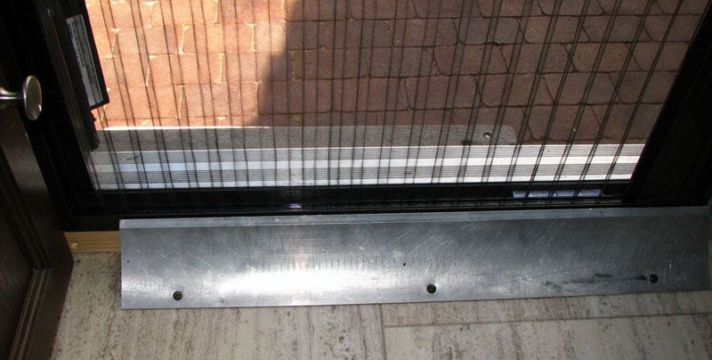 Retractable Screen Door Plate On Floor