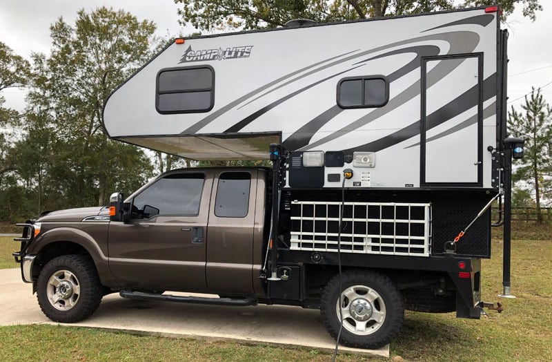 Flatbed Truck Side Storage Using ATV Ramps 3