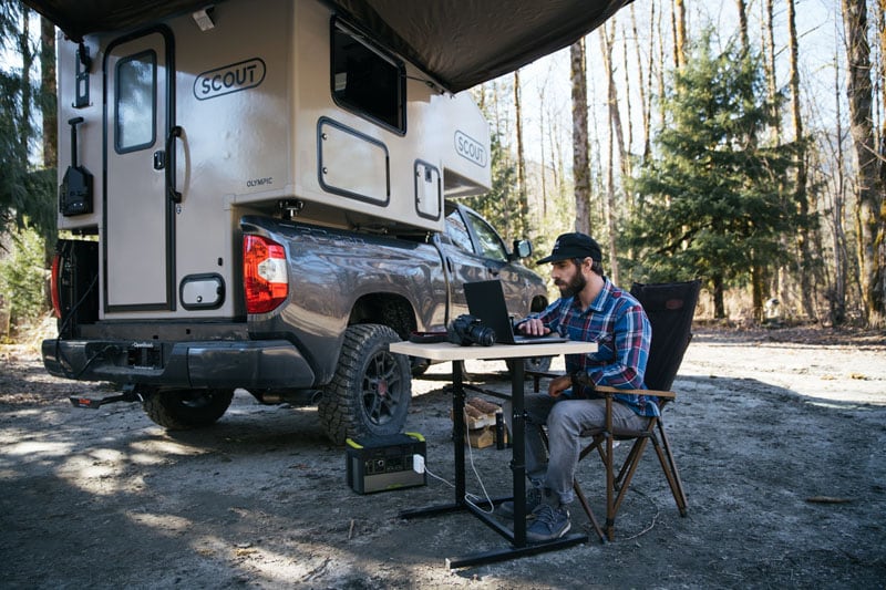 Scout Olympic Camper Working Outside