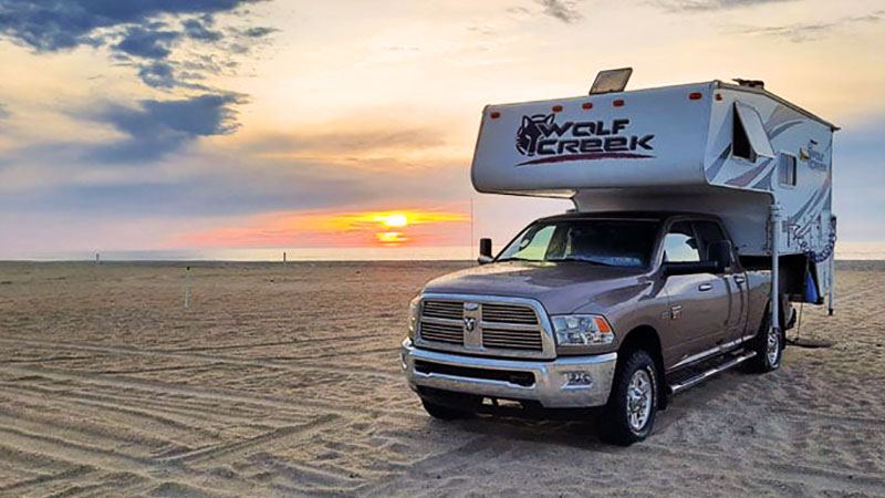 Wolf Creek truck camper at the beach