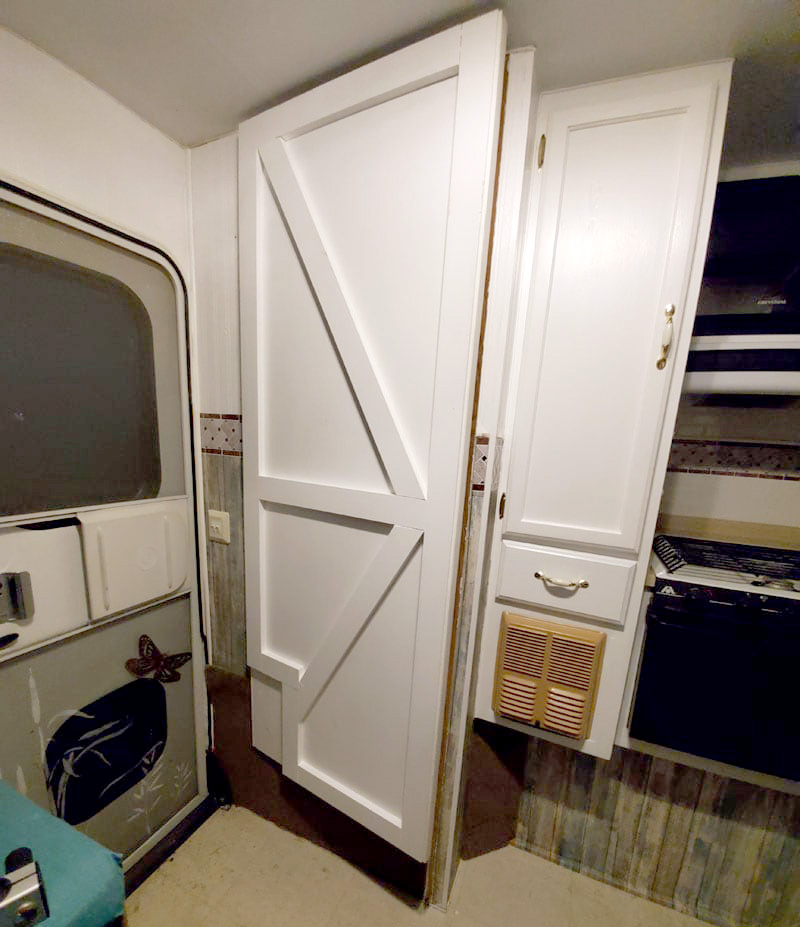 New Camper Barnyard Door White Cabinetry