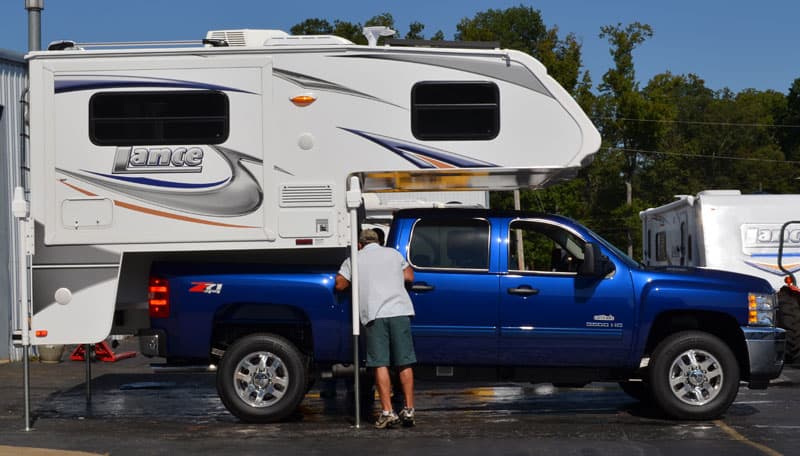 Lance Camper Being Loaded On Truck