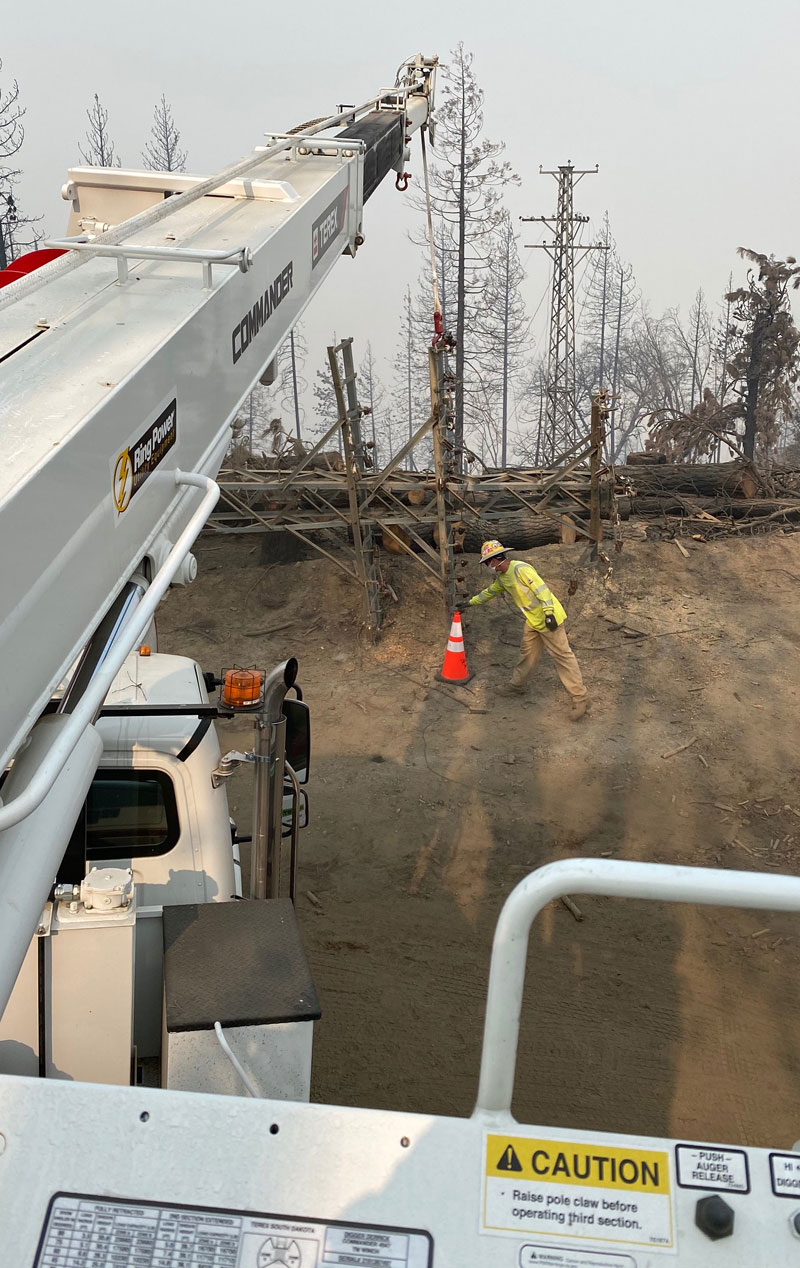 Poles Restoring Power Creek Fire California