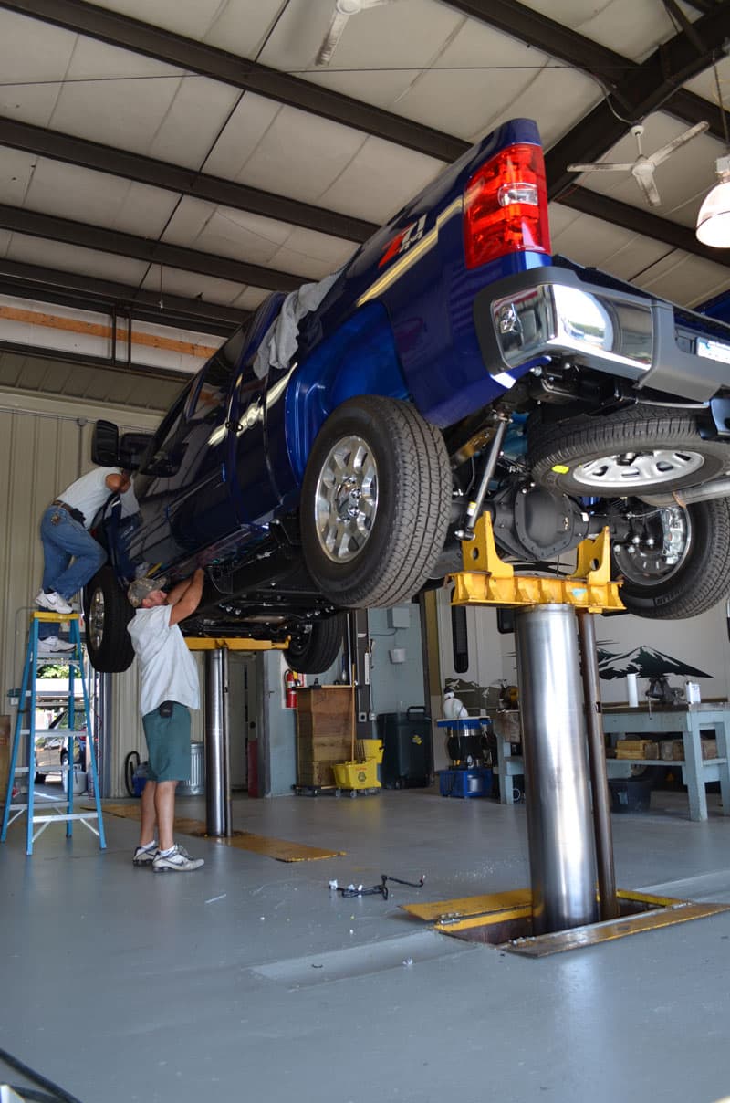 Truck On Lift Turnbuckle Installation At Parkview