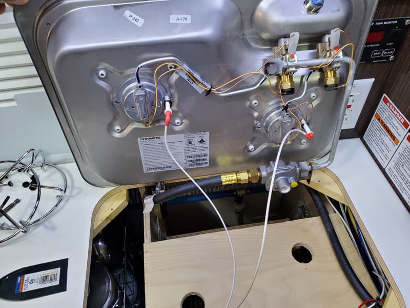 Heat Shrink and plywood under stove