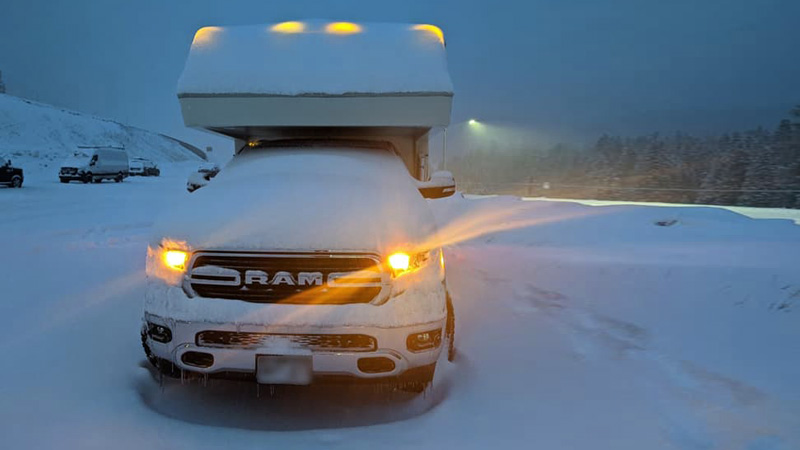 Northern Lite Camper Buried In Snow