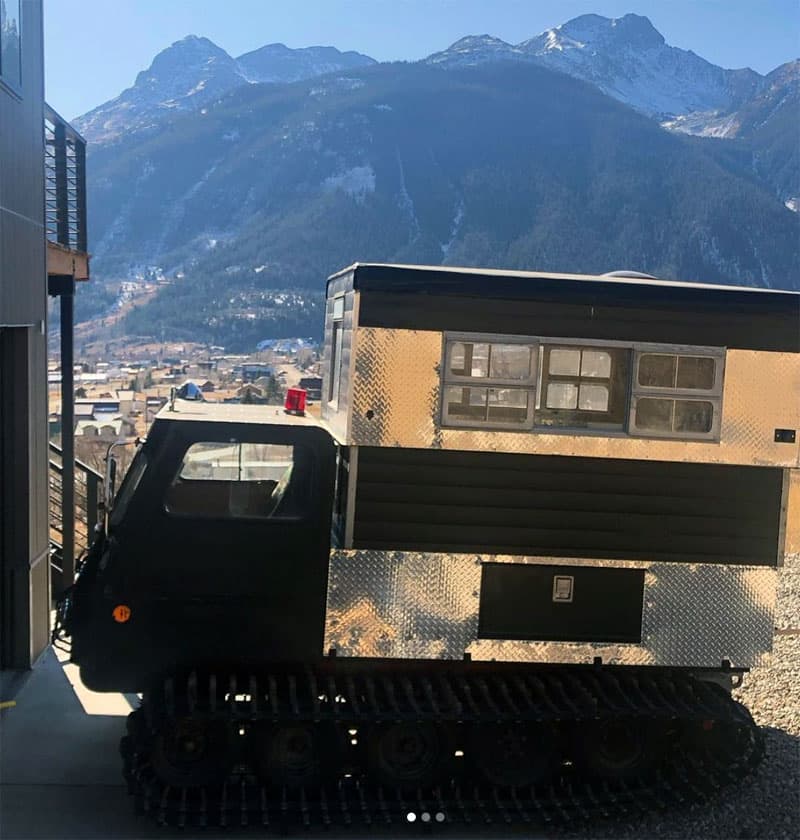 Snowcat Parked In Driveway At Home