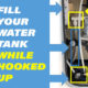 Water tank fill while hooked up