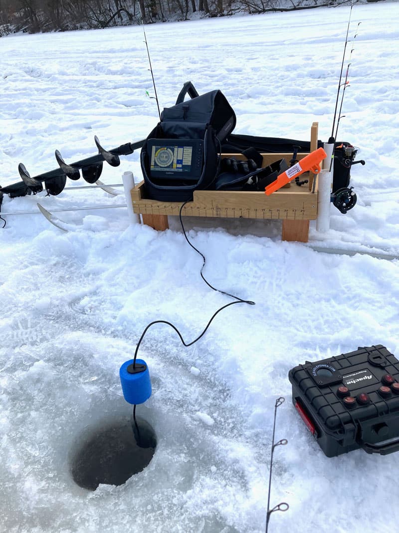 Ice Fishing Hole With Supplies