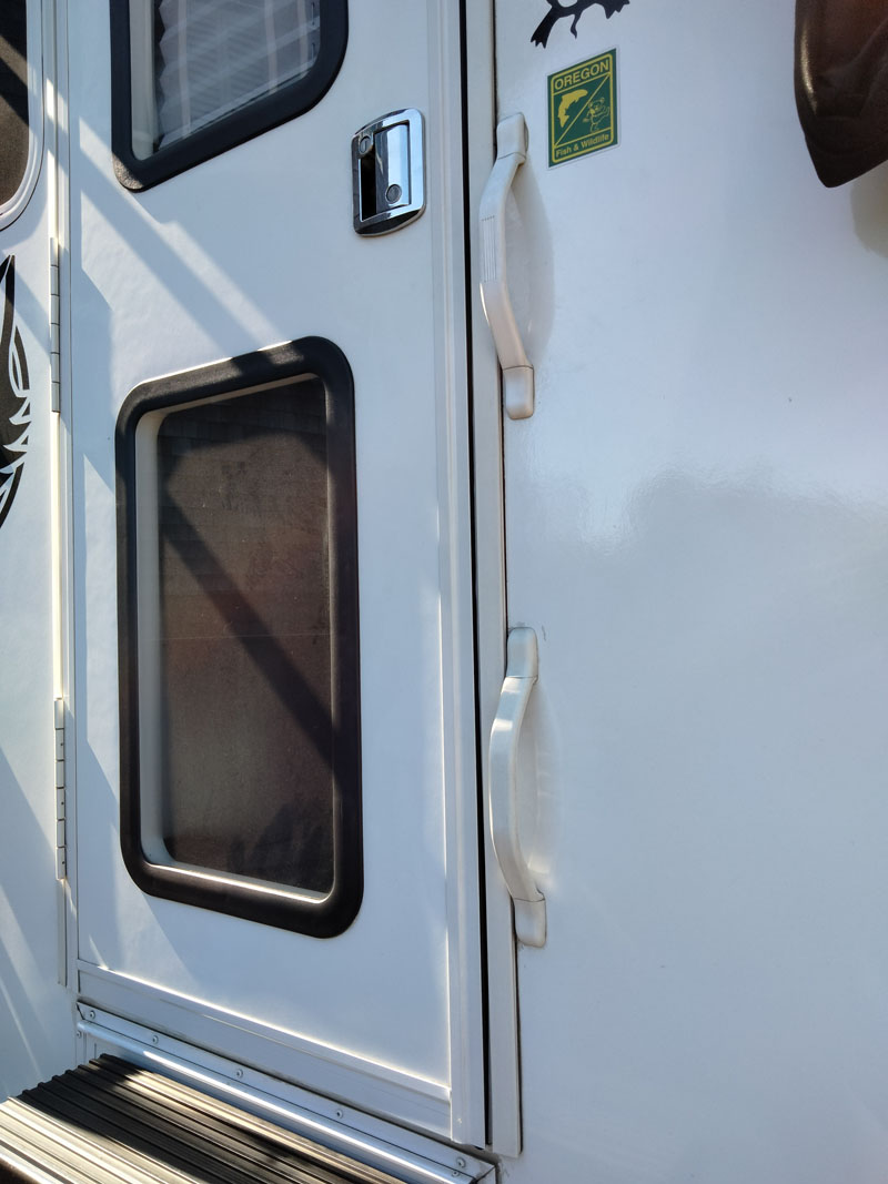 Lower Door Access Handle On Wolf Creek Camper