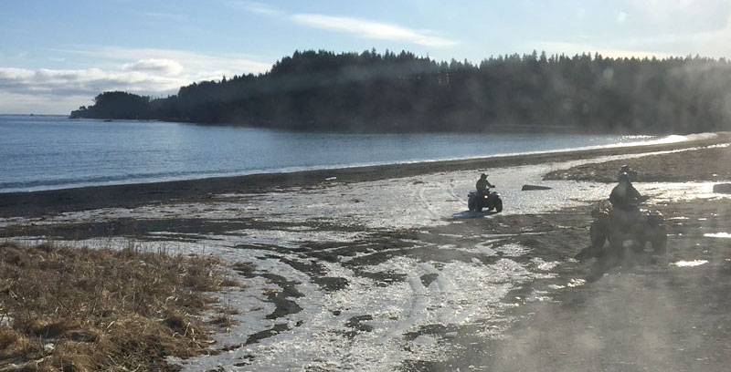 ATV Riding In The Winter While Camping