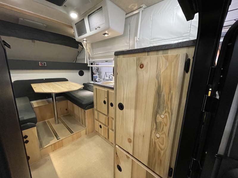 Hallmark Victor Camper Interior with Beetle Kill Pine Passenger Side