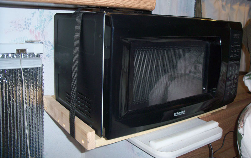 Microwave Shelf Secured with strap