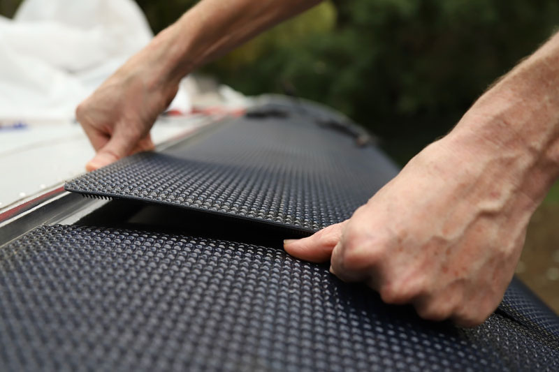 Removing Solar Panels Is A Tedious Process Of Disengaging The Velcro Inch By Inch