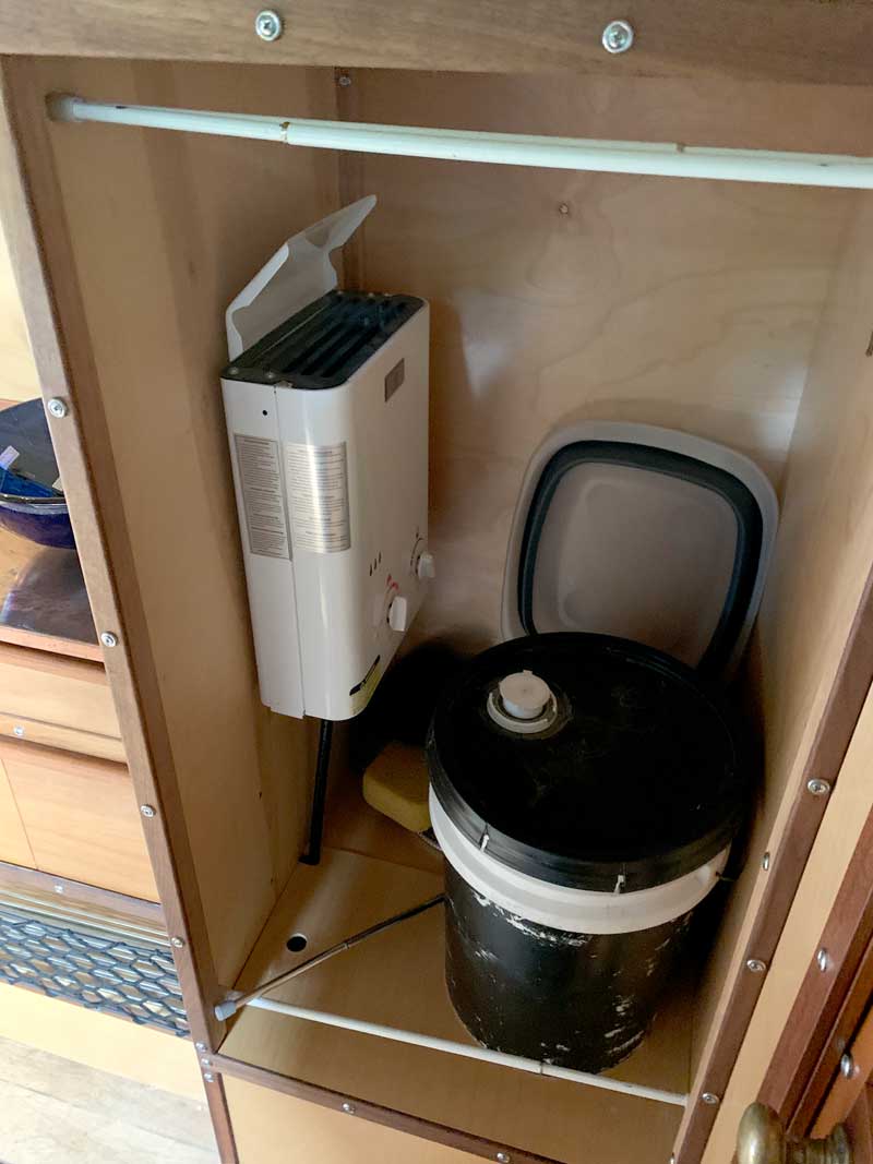 On Demand Water Heater In Levitating Camper