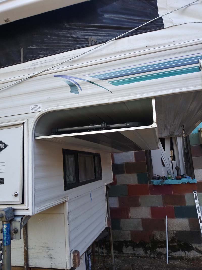 Under The Cabover Camp Chair Storage with chair