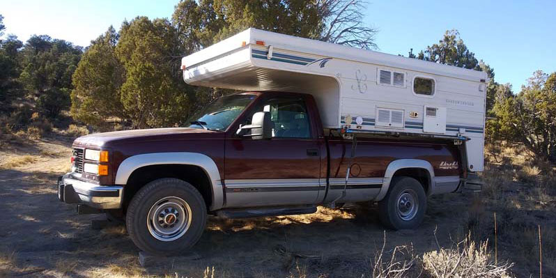 Under The Cabover Camp Chair Storage Before