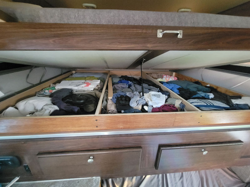 Underbed Clothes Storage with stuff inside