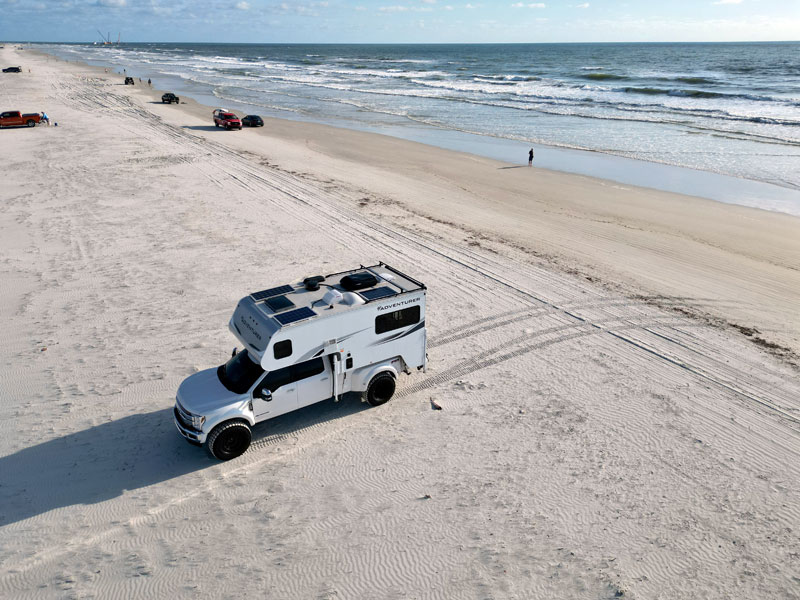 Adventurer And Ford F450 On The Beach