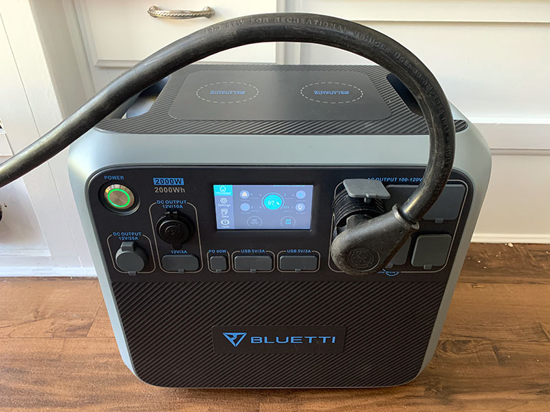 Bluetti AC200P plugged into a truck camper