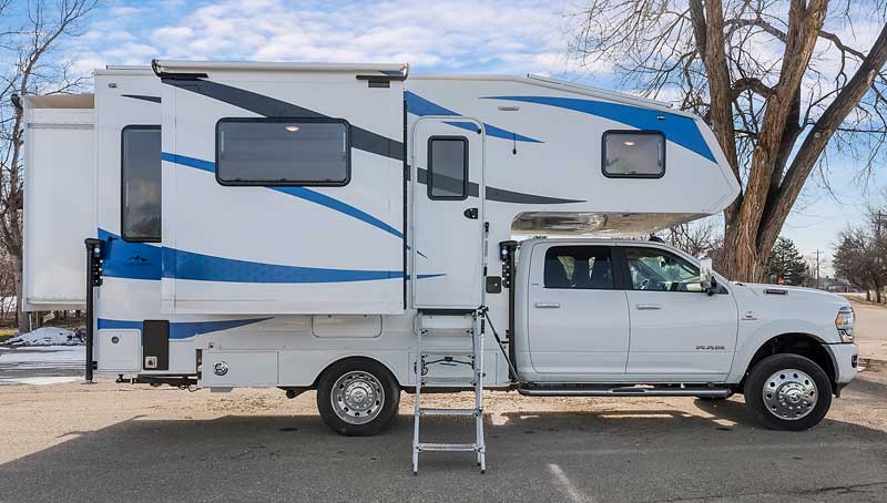 Rugged Mountain Triple Slide Camper Side View