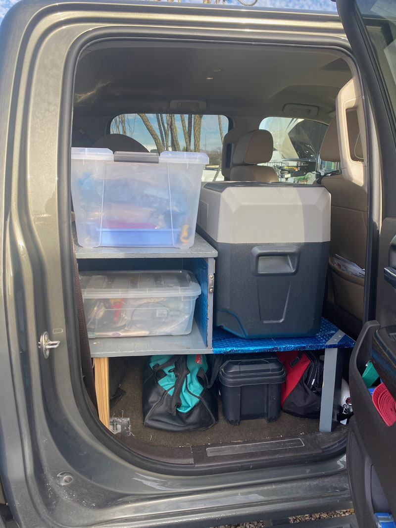 Backseat Conversion To Storage Shelf With Supplies 15