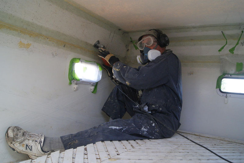 Tom sanding the overcab area