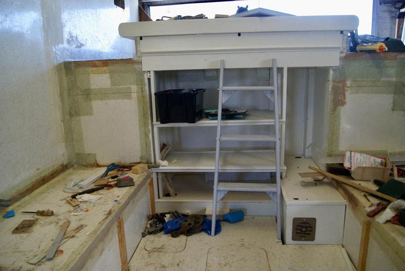Bed platform in DIY camper from fifth wheel