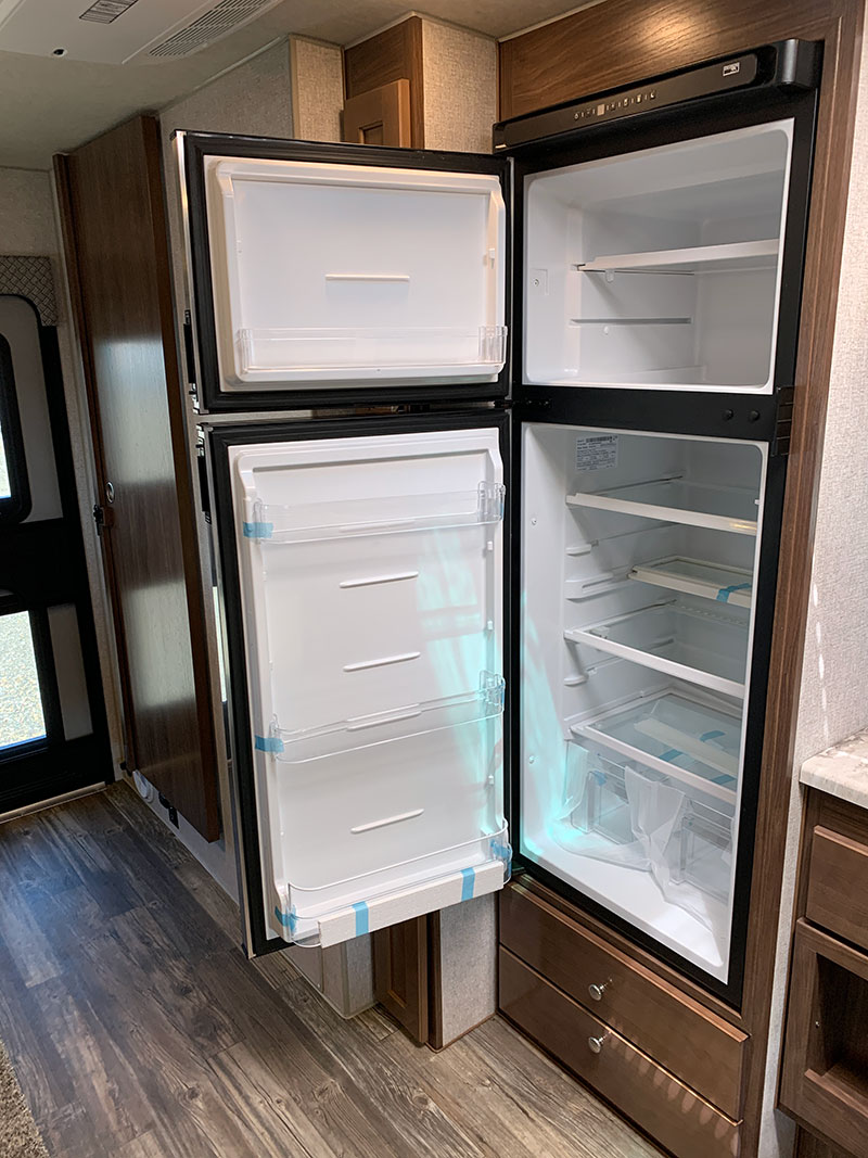 2024 Arctic Fox 1140 10 Foot 12 Volt Fridge Open