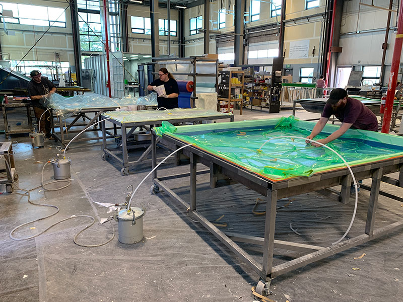 Cube Series Fiberglass Team Working