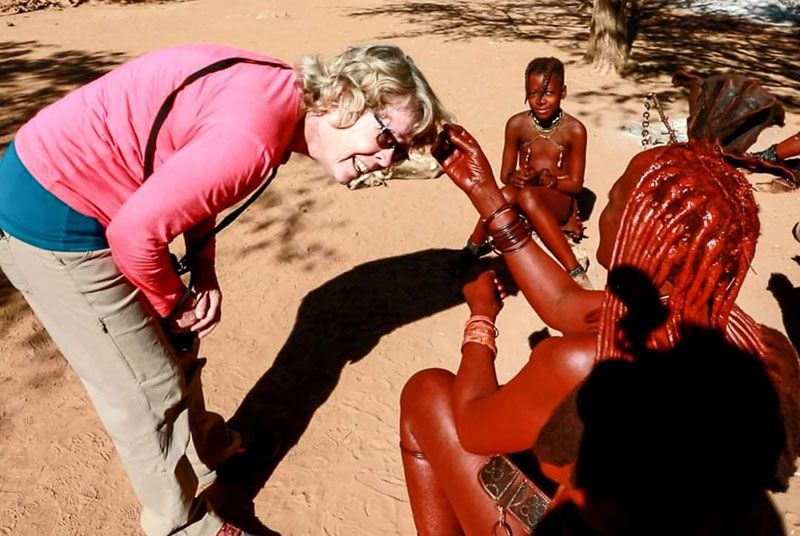 Overlanding Africa Ovahimba Woman Feeling Laurie's Hair